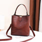 👜 Limited-time 50% off! Shiny crocodile-print handbag with gold hardware 💼